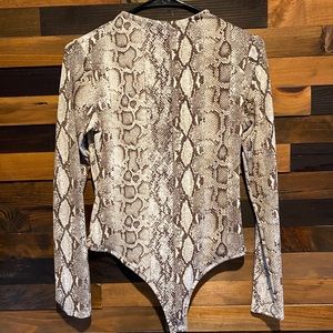Brand new Naked Wardrobe snake print bodysuit